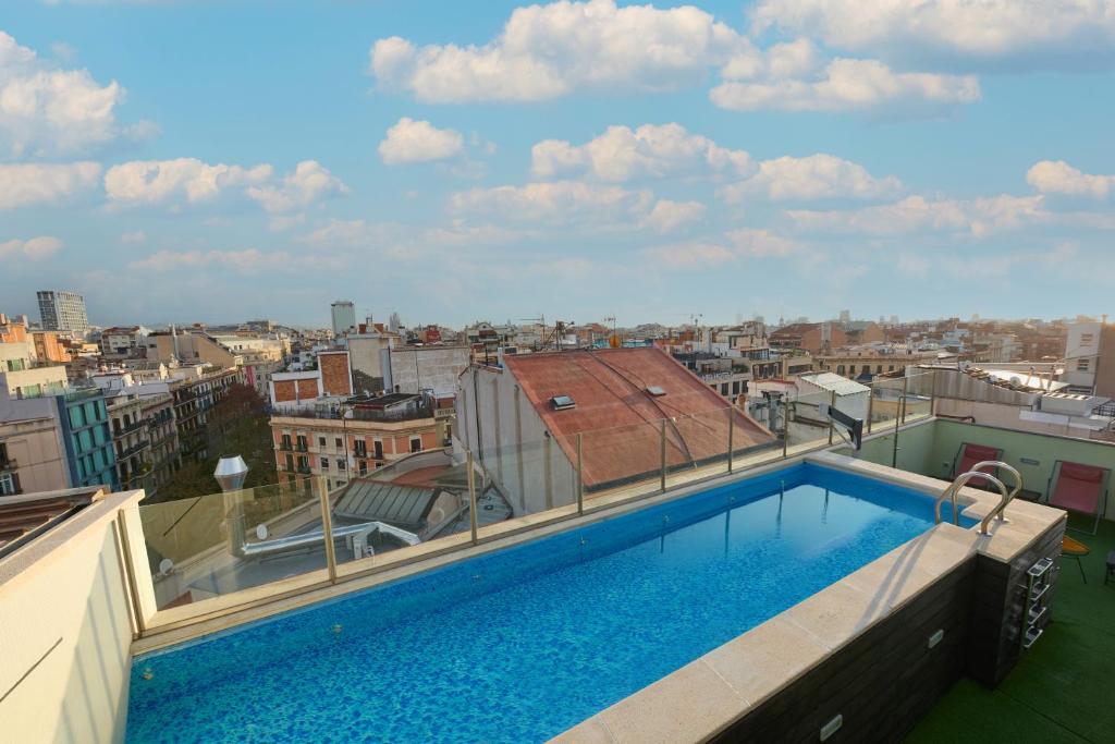 Doté d'une connexion Wi-Fi gratuite, d'un restaurant et d'une piscine extérieure de saison, le 1881 Barcelona Gran Rosellon Hotel propose un hébergement à Barcelone, à 5 minutes à pied...