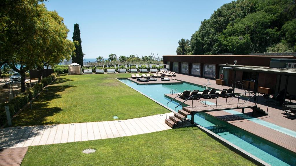 Miramar Barcelona has a picturesque setting within gardens on Montjuïc Mountain, overlooking the Mediterranean Sea.
