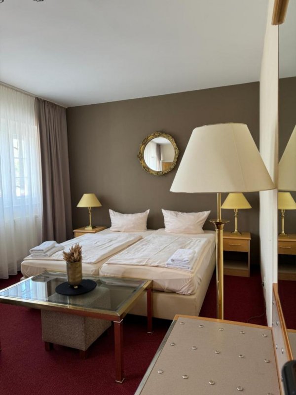 This stylish hotel provides comfortable accommodation and free Wi-Fi in public areas and some rooms.