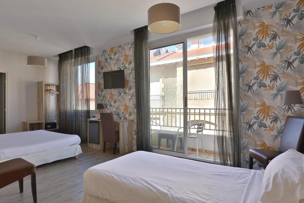 Brit Hotel Marbella sits in Biarritz's Old Harbour district, just a five-minute stroll from three sandy beaches.