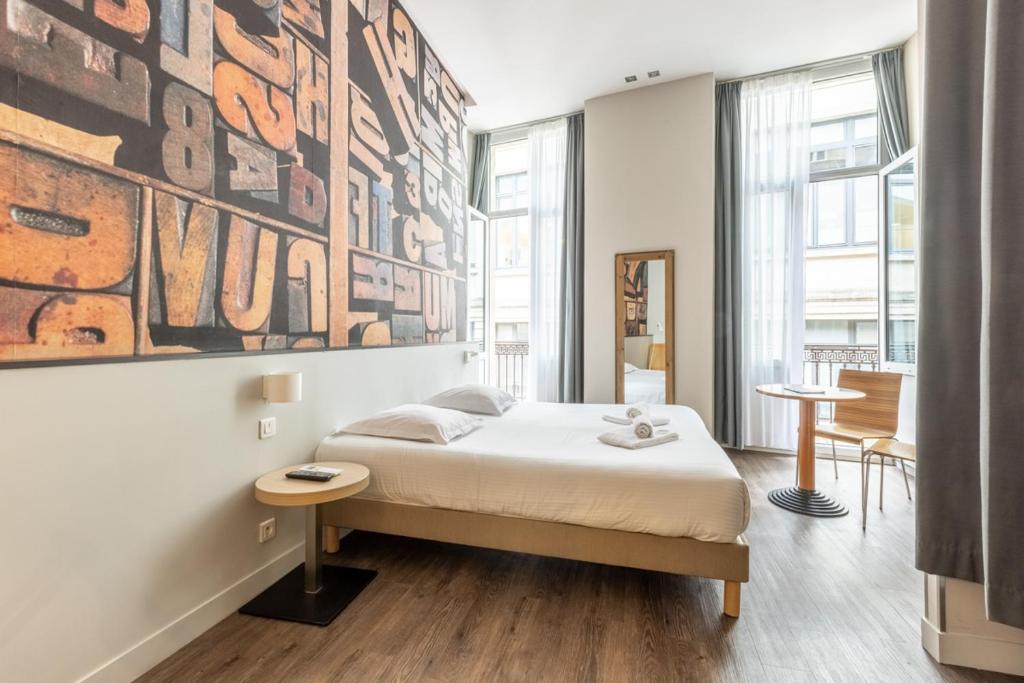 El Hotel de la Presse está situado en el centro de Burdeos, junto a la Rue Sainte-Catherine, y a menos de 5 minutos a pie del Grand Théâtre y Quinconces.