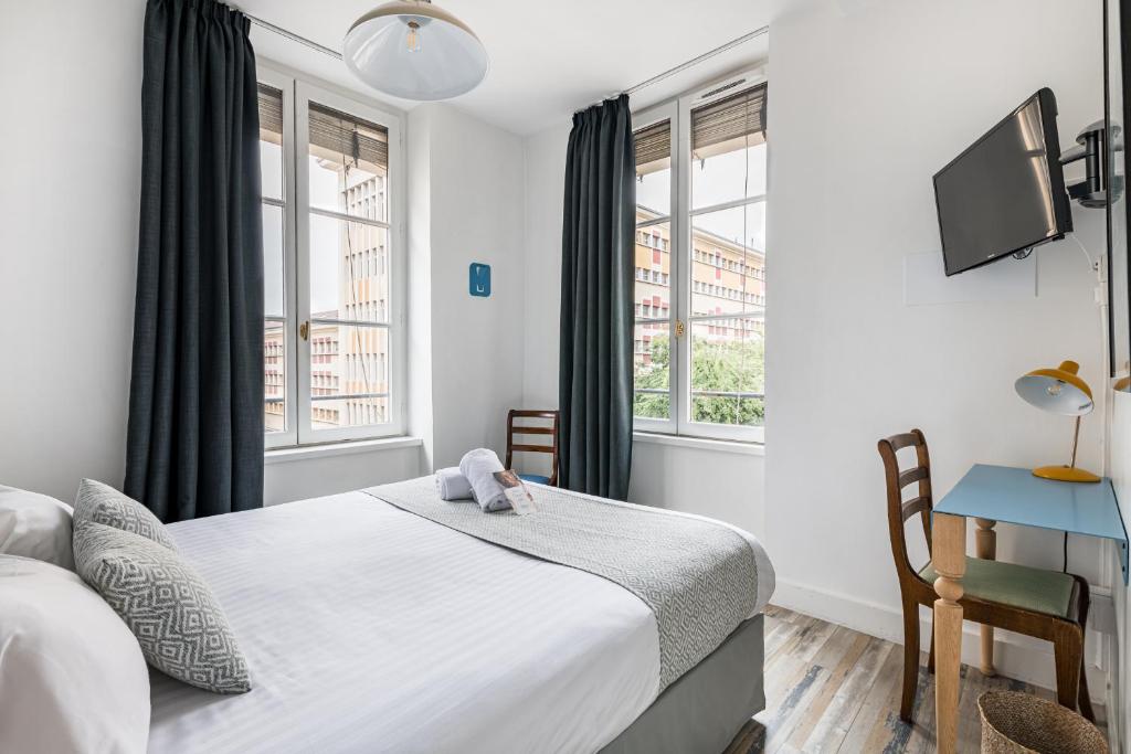 L'Hôtel du Simplon propose des hébergements en suite dans le quartier de Presqu'île de Lyon entre le Rhône et la Saône.