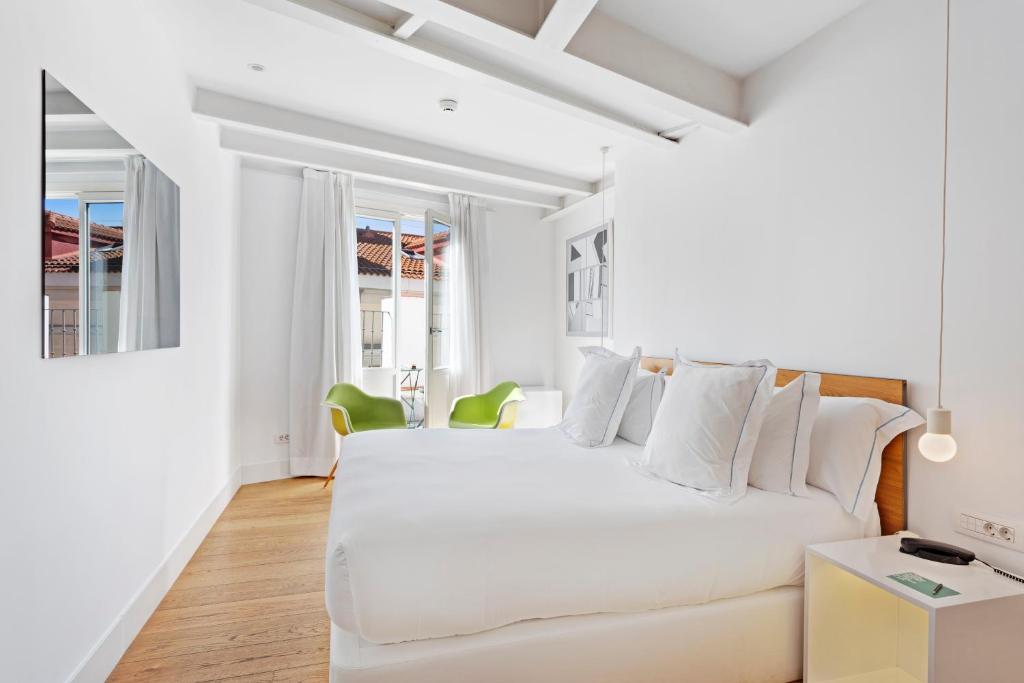 Situato in posizione centrale, One Shot Prado 23 offre camere di design con TV e connessione Wi-Fi gratuita.