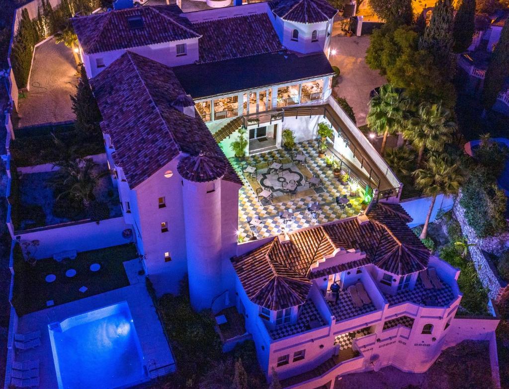 This charming hotel rests in a residential area in the outskirts of Malaga and has breathtaking views of the city and coast.