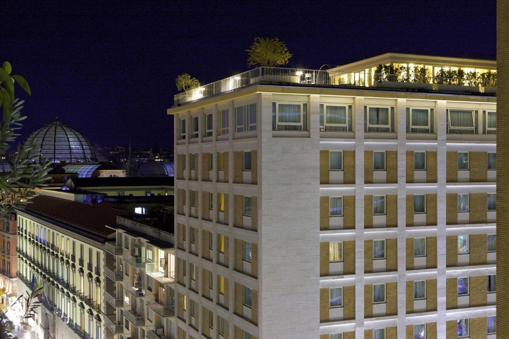 Admire the view across Naples city centre from the rooftop terrace of Renaissance Naples Hotel Mediterraneo.