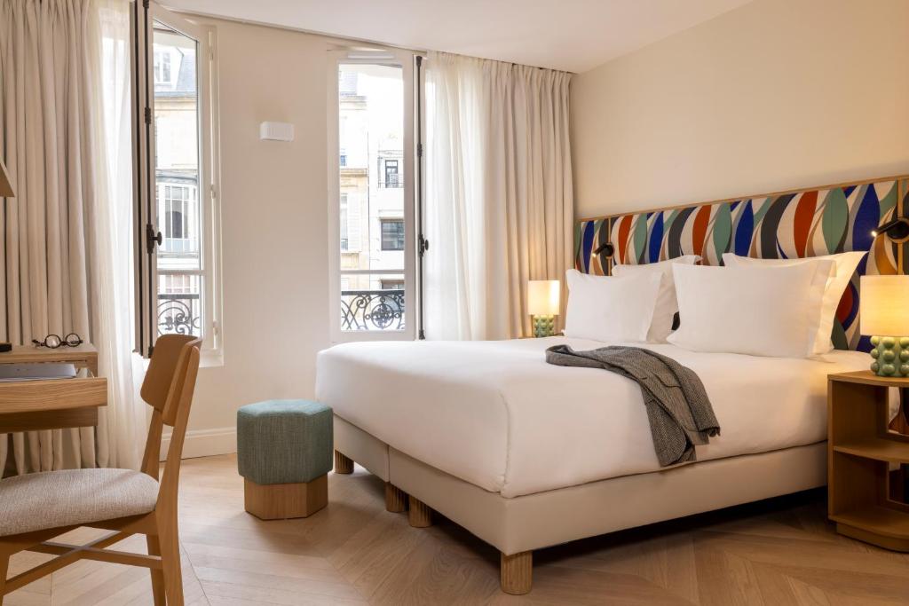 Das Padam Hôtel verfügt über ein Fitnesscenter, eine Terrasse, ein Restaurant und eine Bar in Paris. Dieses 4-Sterne-Hotel bietet Zimmerservice und eine 24-Stunden-Rezeption.
