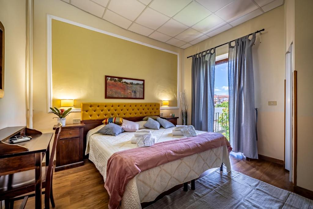Das Hotel Minerva liegt 300 m vom Fluss Arno und 8 Gehminuten vom Palazzo dei Congressi von Pisa entfernt.