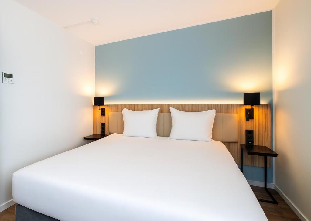 Situé dans le centre de Reims, à 10 minutes à pied du centre des expositions de Champagne Reims, ce Campanile propose des chambres avec salle de bains privative avec connexion Wi-Fi gratuite. Il est 3.
