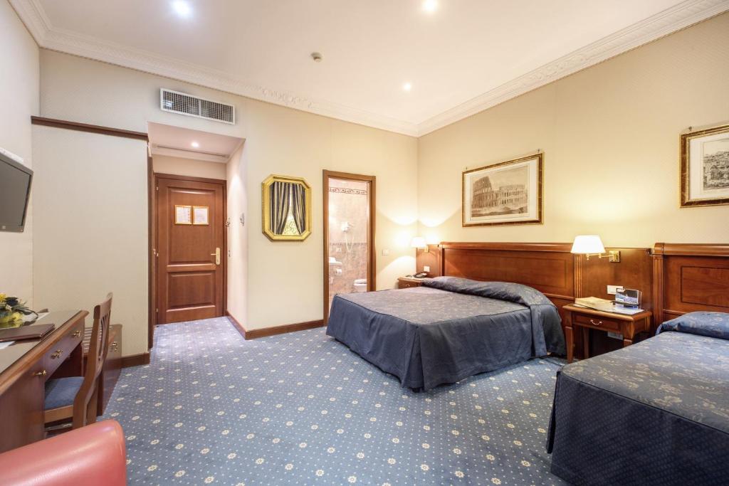 Das familiengeführte Hotel Artorius liegt in einer ruhigen Gegend des beliebten Viertels Monti von Rom und bietet klimatisierte Zimmer und Studios mit kostenfreiem WLAN.