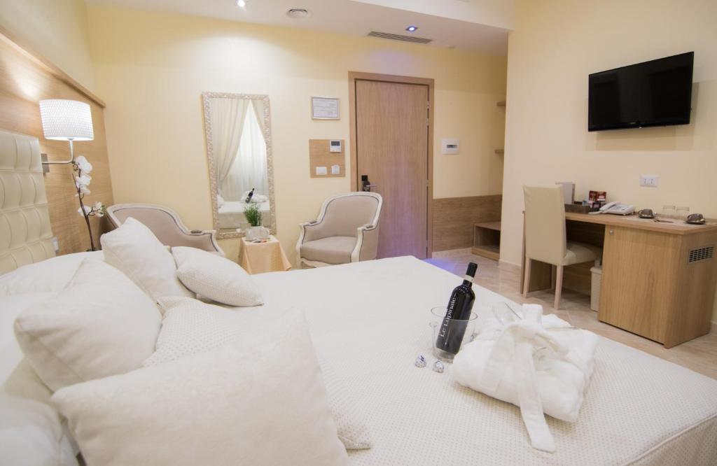 Palais Esposizione L'hôtel propose un hébergement à Rome, à 110 mètres du Palazzo delle Esposizioni. Une connexion Wi-Fi est disponible gratuitement dans tout l'établissement.