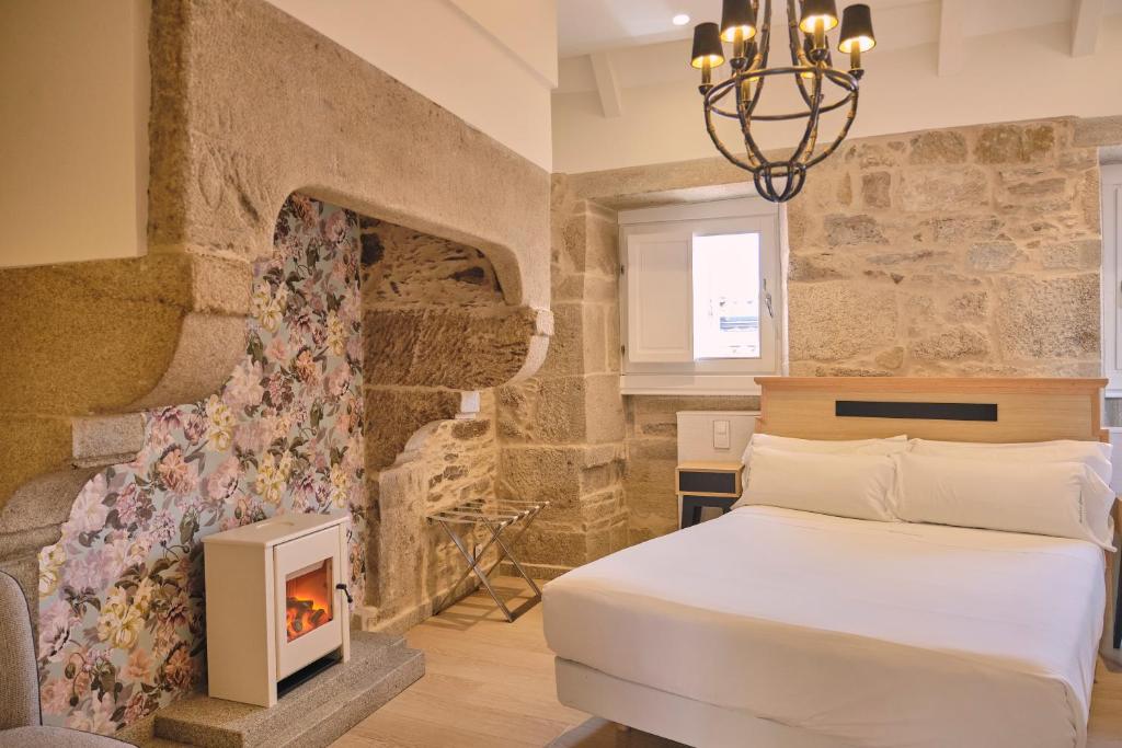 Hotel Praza Quintana is an elegant hotel located in the historic center of Santiago de Compostela, a 1-minute walk from the Cathedral of Santiago de...