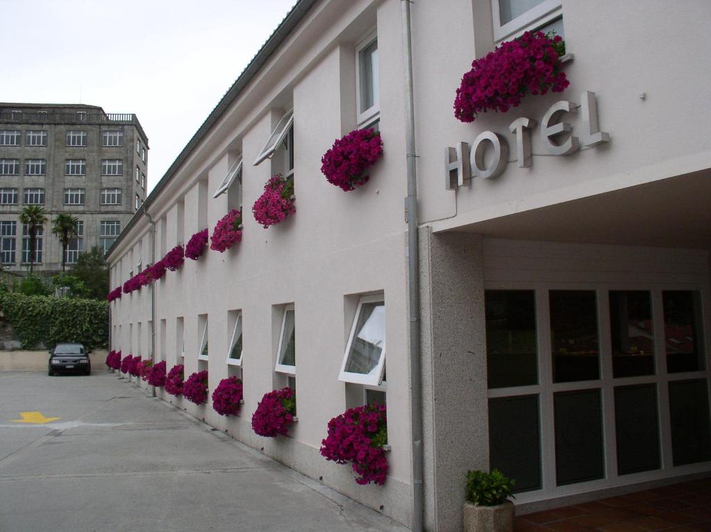 This bright, simple hotel is located close to the old town of Santiago de Compostela, which includes its world-famous Cathedral.