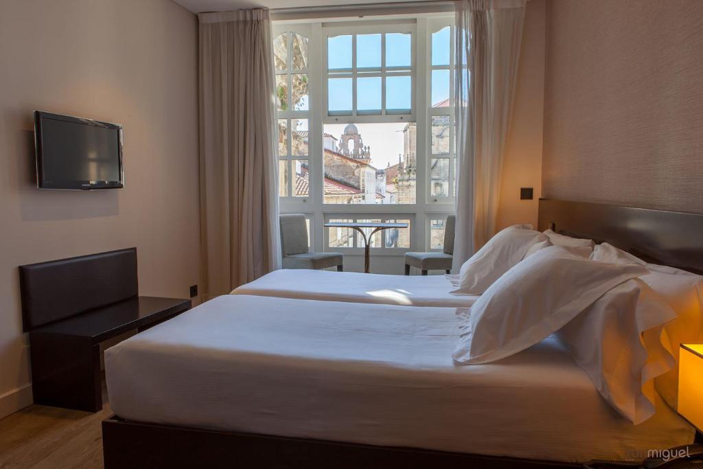 This historic building is situated just 200 metres from Santiago Cathedral, by the San Miguel dos Agros Church.