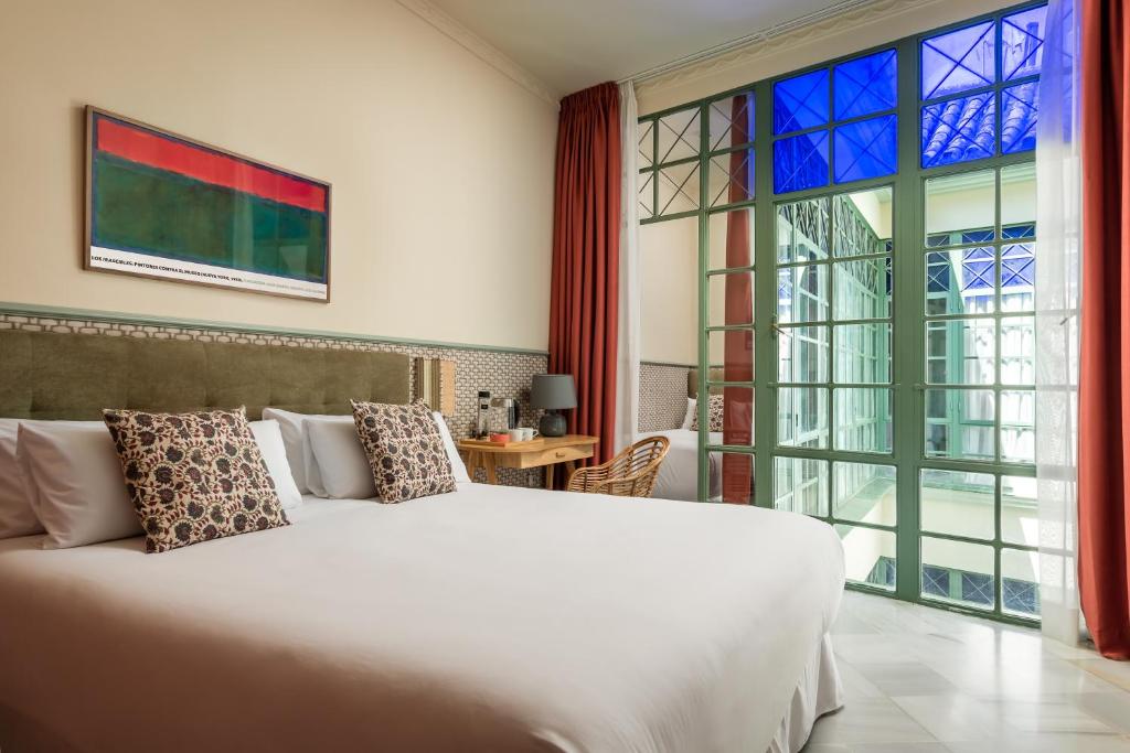 Este hotel de valor por dinero está situado en el centro histórico y monumental de Sevilla y dispone de conexión Wi-Fi gratuita.
