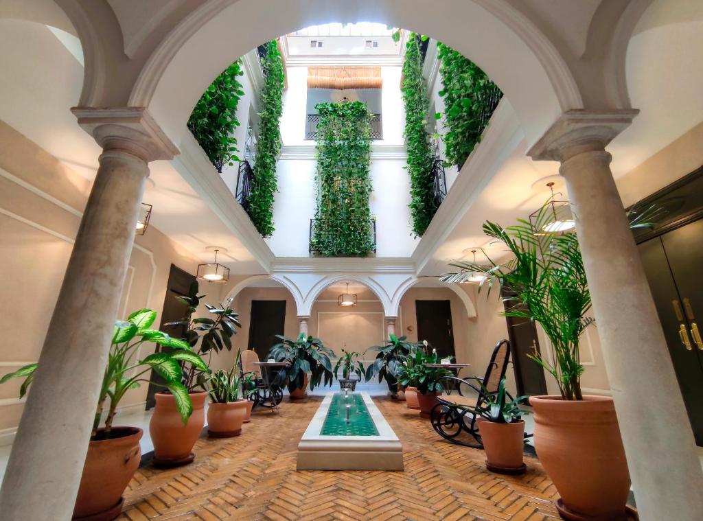 L'hôtel Gravina 51 est un manoir restauré du XVIIIe siècle, avec 2 patios typiques de Séville.