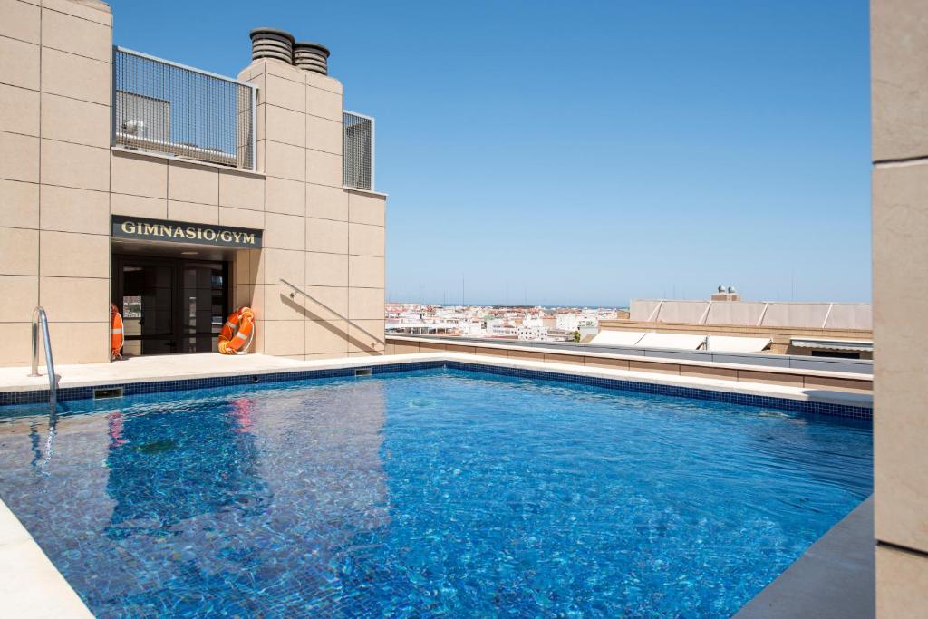 Hotel Valencia El centro está a 400 metros de la Ciudad de las Artes y las Ciencias de Valencia, a 3 km del centro de la ciudad.