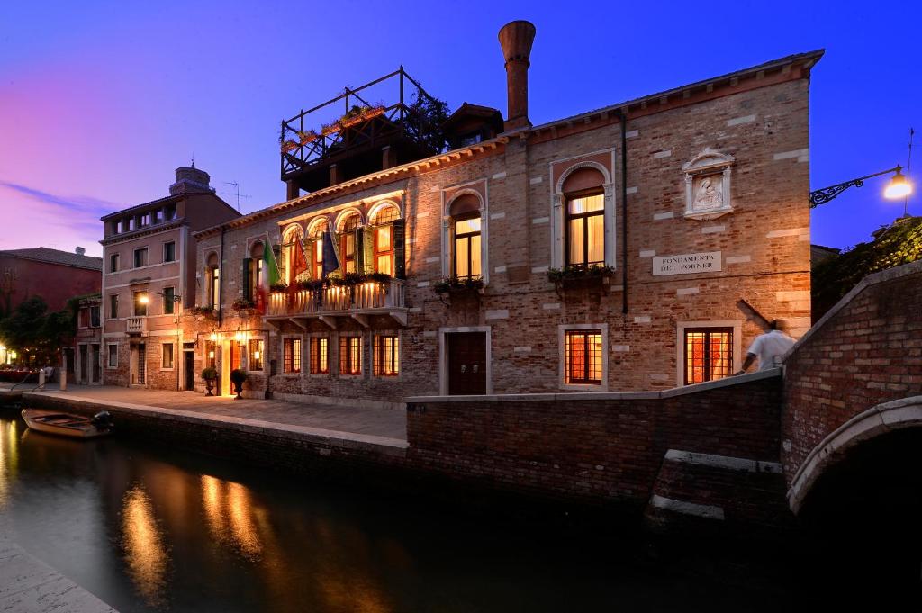 El Palazzetto Madonna se encuentra en un edificio histórico, a menos de 15 minutos a pie del Puente Rialto de Venecia.