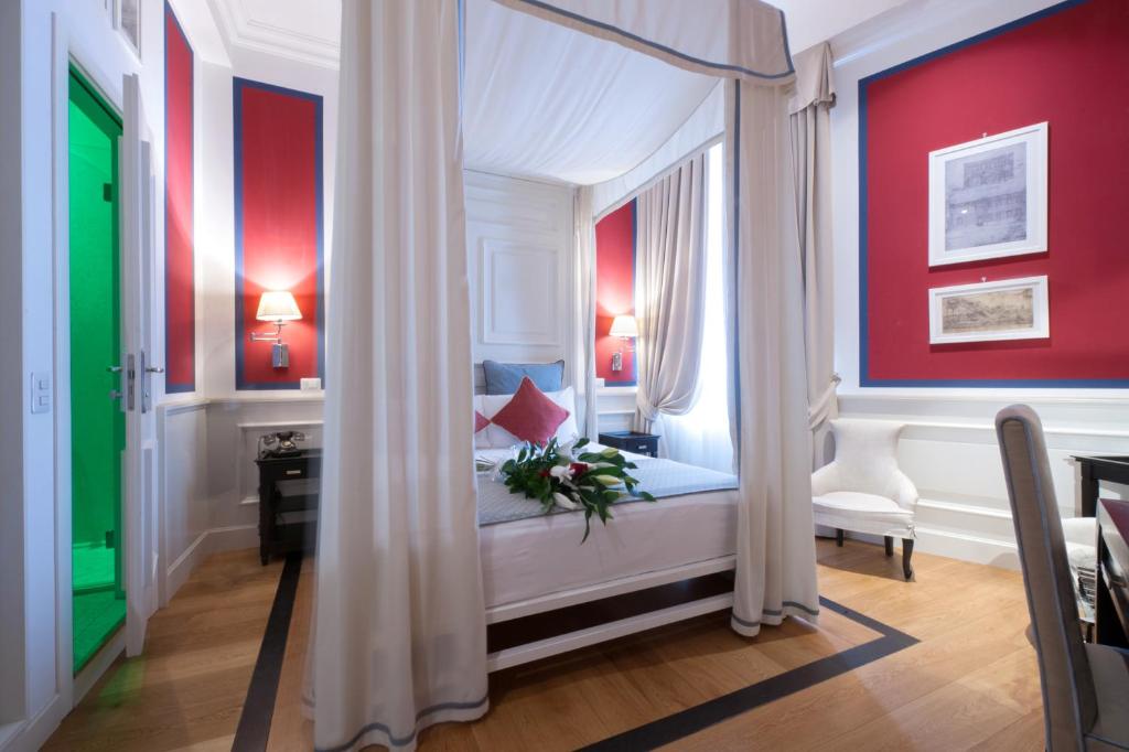 Hotel Bologna est un bâtiment historique face à une petite place romantique à seulement 50 mètres de l'aréna de Vérone.