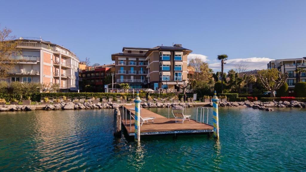 Located a pleasant 10-minute walk from Bardolino town centre, Hotel Kriss Internazionale is set right on Lake Garda, offering a private beach, beautiful...