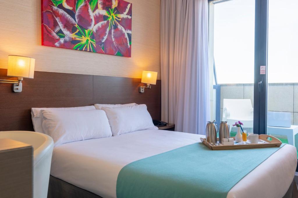 Das Hotel & Spa Real Ciudad De Zaragoza liegt günstig neben der Autobahn A23 und ist eine 8-minütige Fahrt von der Zuera Carting-Schaltung und 7 km vom...