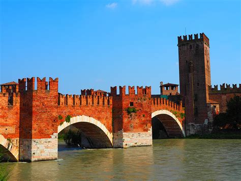 Castelvecchio Bridge, A red-brick medieval bridge over the Adige River.